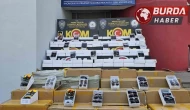 Adana’da 14 milyonluk kaçak güneş gözlüğü ve telefon yakalandı.