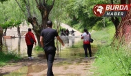 Keban Barajı kapaklarını açılınca işyeri bahçeleri sular altında kaldı