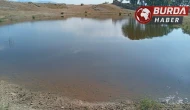 Manisa'da serinlemek için gölete giren çocuk hayatını kaybetti