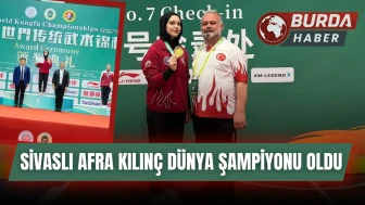 Çin'den altın madalyayla dönen Afra Kılınç, meşalelerle karşılandı.