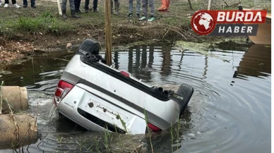 Bursa’da kontrolden çıkan otomobil göle uçtu