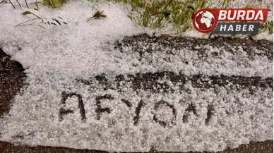 Afyonkarahisar'da yağan dolu kara yolunu beyaza bürüdü
