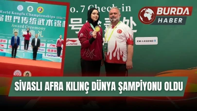 Çin'den altın madalyayla dönen Afra Kılınç, meşalelerle karşılandı.