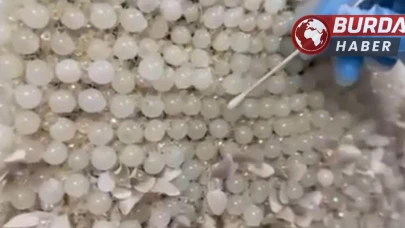 Gelinlik üzerinde boncuk şeklinde 25 kilo uyuşturucu ele geçirildi