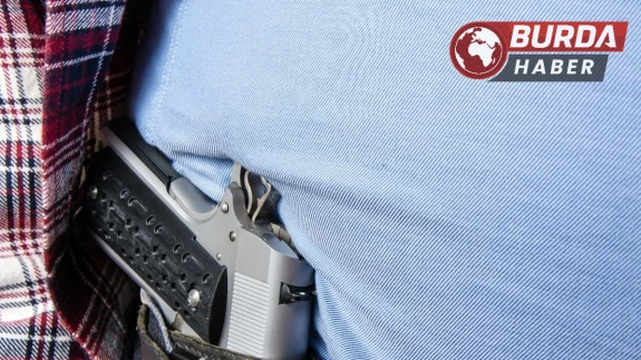 Elmadağ'da tartıştığı gruba silah çekti, darbedildi.