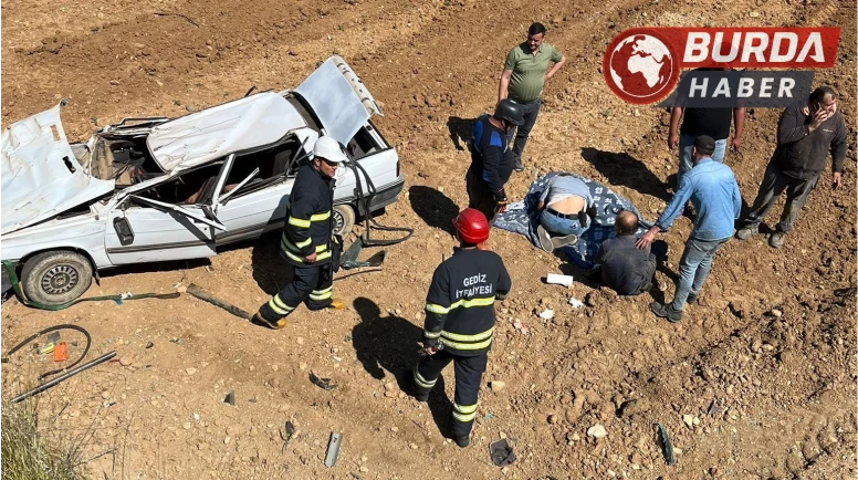 Gediz’de otomobil tarlaya uçtu, 2 kişi yaralandı